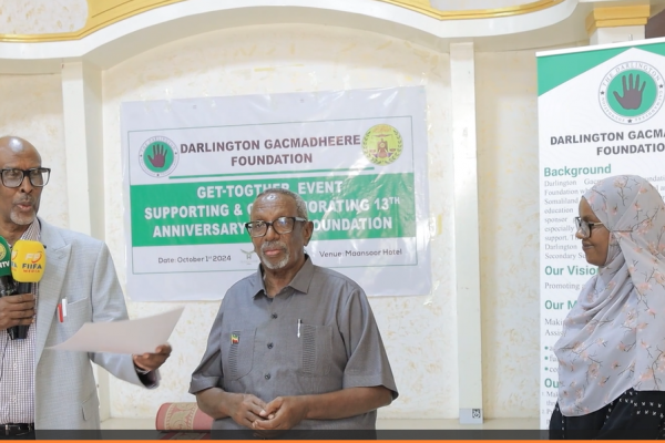 Professor Eid Ali Ahmed presenting one of the awards 